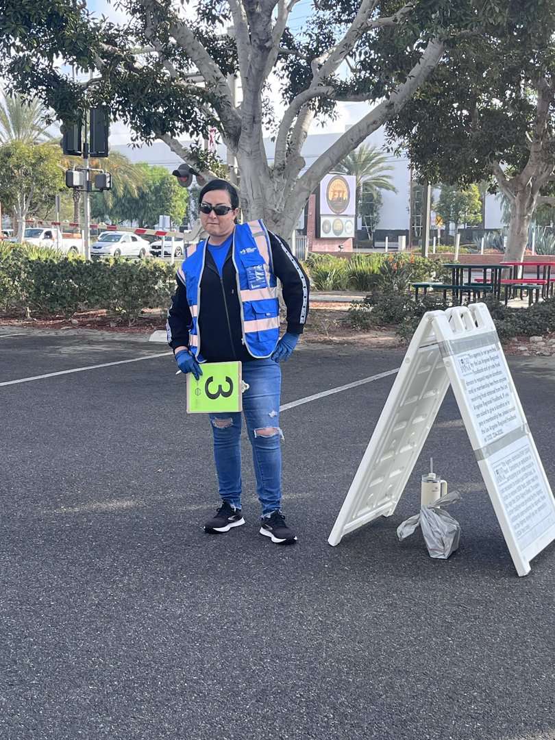 A Local 132 member in a hi-vis safety vest